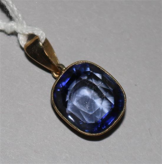 A 9ct gold and sapphire pendant and a fine link chain (chain a.f.)